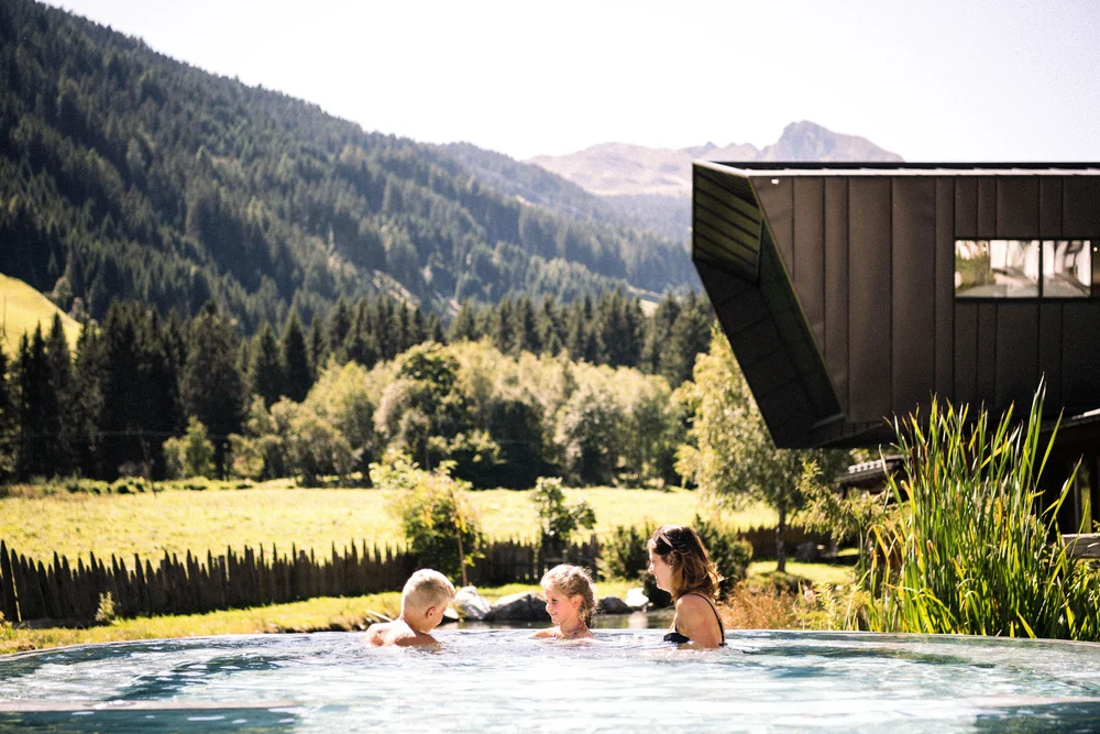 The family water world at the family hotel with a pool in South Tyrol The family water world at the family hotel with a pool in South Tyrol